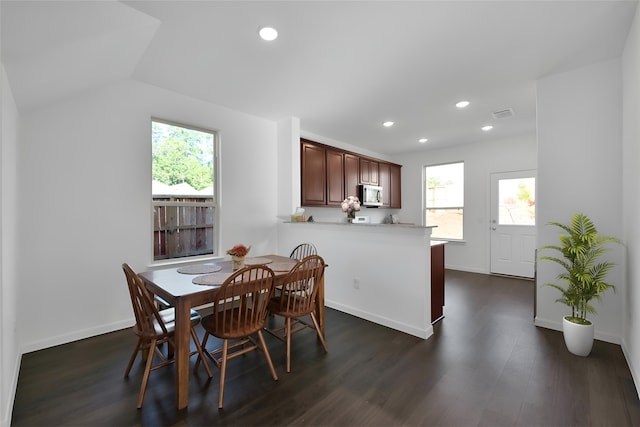 109 Chestnut Gate Dr, Conroe, TX 77378 - dining room featuring dark wood finished floors, recessed lighting, baseboards, and vaulted ceiling