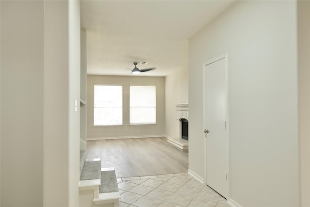 23902 Spring Way Dr, Spring, TX 77373 - hall featuring light tile patterned floors and baseboards