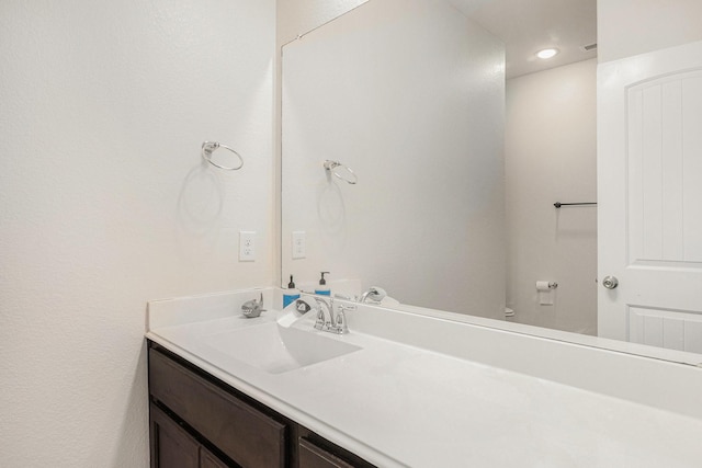23719 Scotsman Dr, Katy, TX 77493 - bathroom with vanity, toilet, and recessed lighting