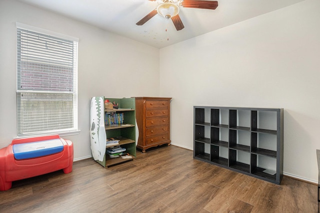 23719 Scotsman Dr, Katy, TX 77493 - miscellaneous room featuring wood finished floors, a ceiling fan, and baseboards