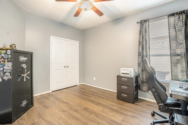 23719 Scotsman Dr, Katy, TX 77493 - office with a ceiling fan, wood finished floors, and baseboards