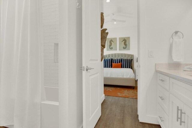 428 Bay Club Dr, Seadrift, TX 77983 - ensuite bathroom with wood finished floors and vanity