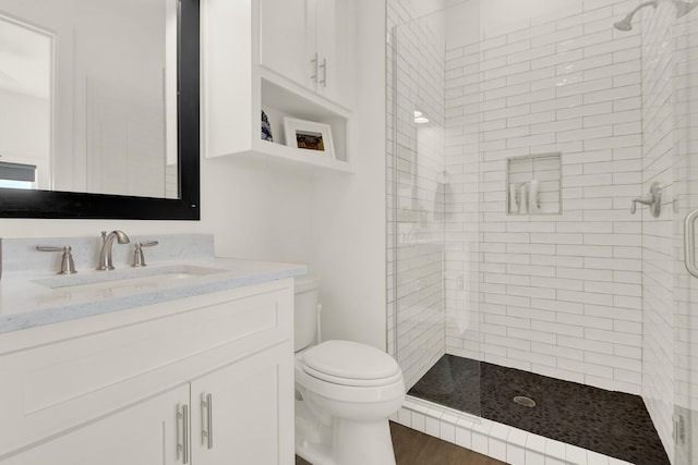 428 Bay Club Dr, Seadrift, TX 77983 - bathroom featuring a shower stall, toilet, and vanity
