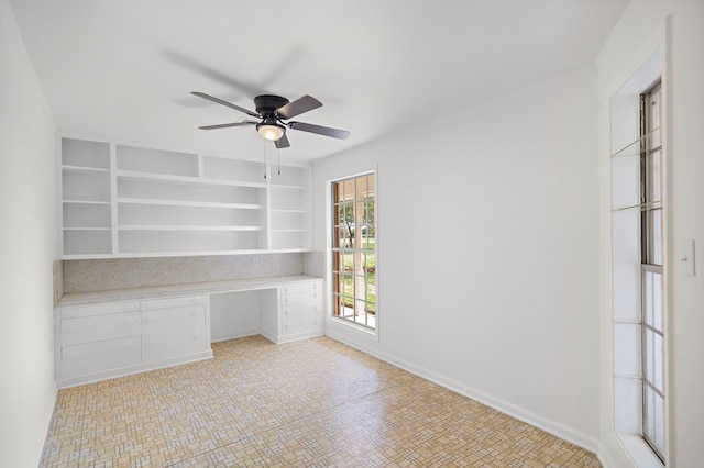 115 Old Caney Rd, Wharton, TX 77488 - unfurnished office featuring built in desk and ceiling fan
