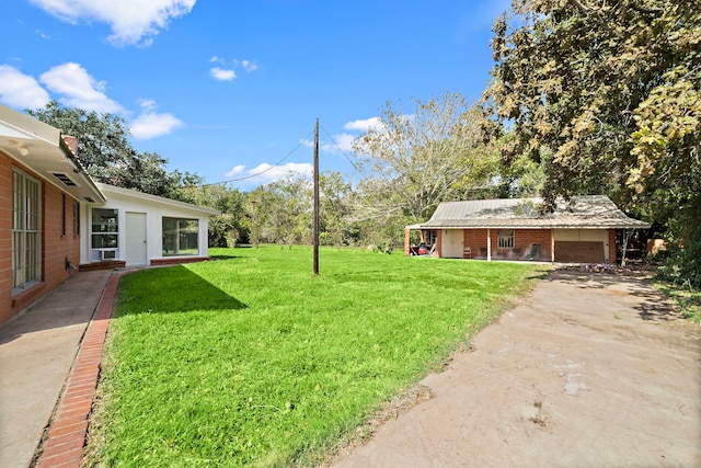 115 Old Caney Rd, Wharton, TX 77488 - view of green lawn featuring driveway