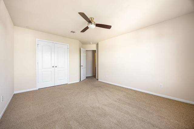 506 Stream Mill Ln, Katy, TX 77494 - unfurnished bedroom featuring baseboards, light colored carpet, a closet, and ceiling fan