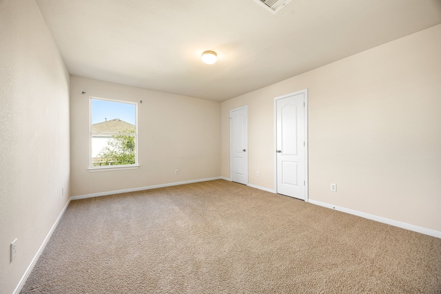 506 Stream Mill Ln, Katy, TX 77494 - spare room featuring light carpet and baseboards