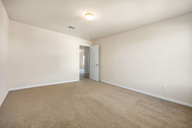 506 Stream Mill Ln, Katy, TX 77494 - spare room featuring baseboards and light carpet