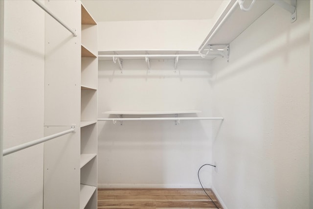 6549 Bayou Glen Rd, Houston, TX 77057 - spacious closet with light wood finished floors