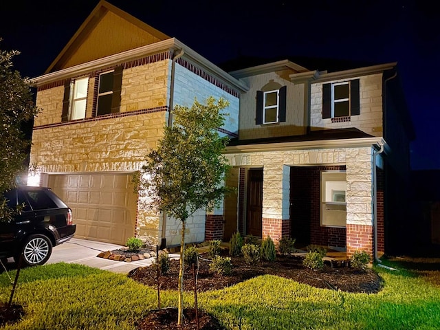 view of front of house featuring stone siding and an attached garage