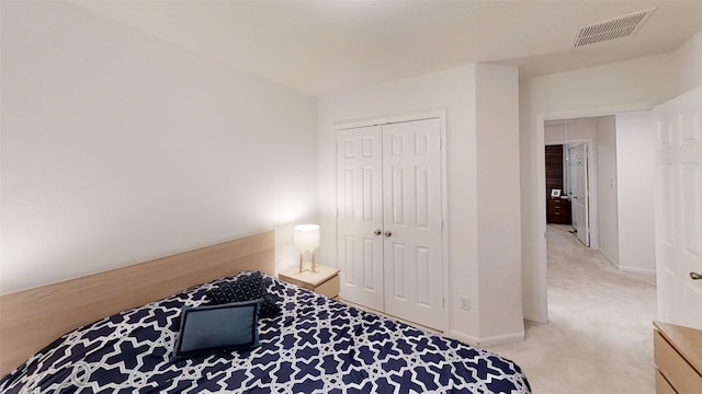 bedroom featuring carpet flooring, a closet, and baseboards