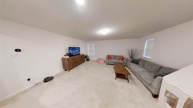 living room featuring light carpet