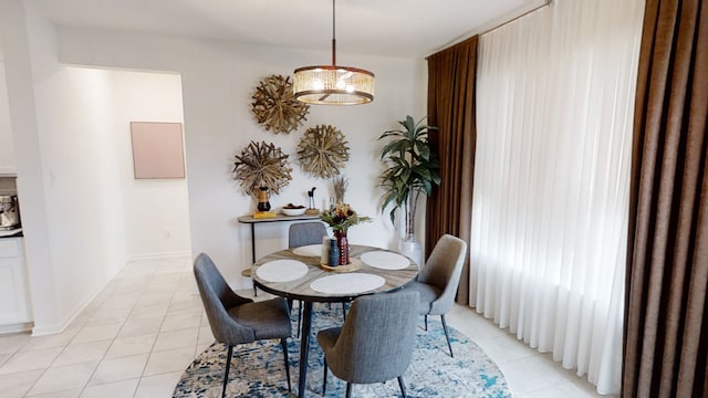 dining room featuring light tile patterned flooring