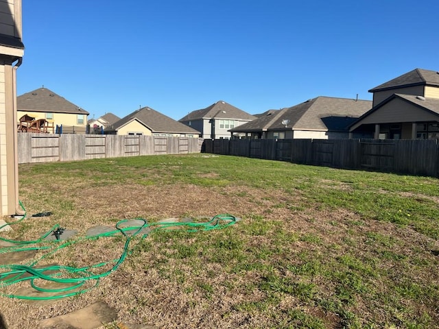 view of yard with a residential view