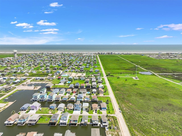 16716 Tahiti Way, Galveston, TX 77554 - aerial perspective of suburban area featuring a large body of water