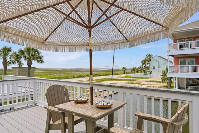 16716 Tahiti Way, Galveston, TX 77554 - wooden deck featuring a water view