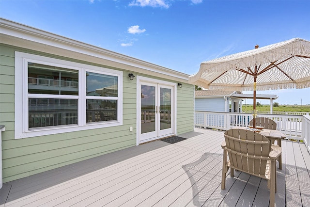 16716 Tahiti Way, Galveston, TX 77554 - wooden deck with french doors