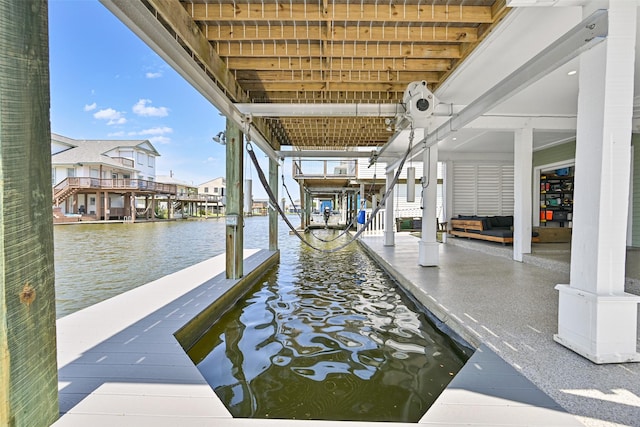 16716 Tahiti Way, Galveston, TX 77554 - dock featuring a water view and boat lift
