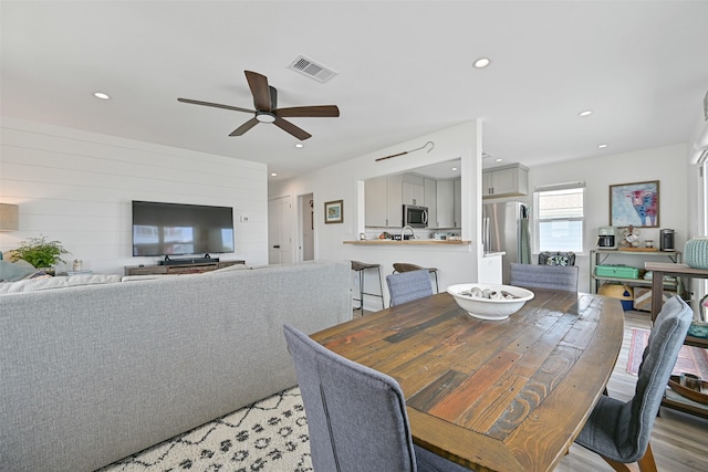 16716 Tahiti Way, Galveston, TX 77554 - dining area with ceiling fan, recessed lighting, and light wood-style flooring