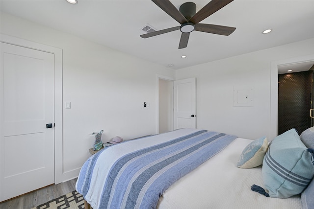 16716 Tahiti Way, Galveston, TX 77554 - bedroom featuring wood finished floors, recessed lighting, and a ceiling fan