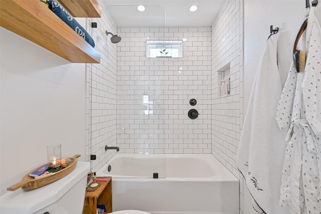 16716 Tahiti Way, Galveston, TX 77554 - bathroom featuring toilet, washtub / shower combination, and recessed lighting