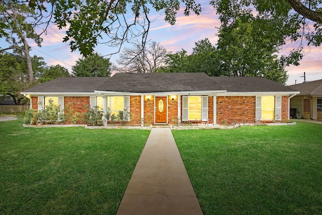 9762 Tappenbeck Dr, Houston, TX 77055 - ranch-style home with a front yard and brick siding