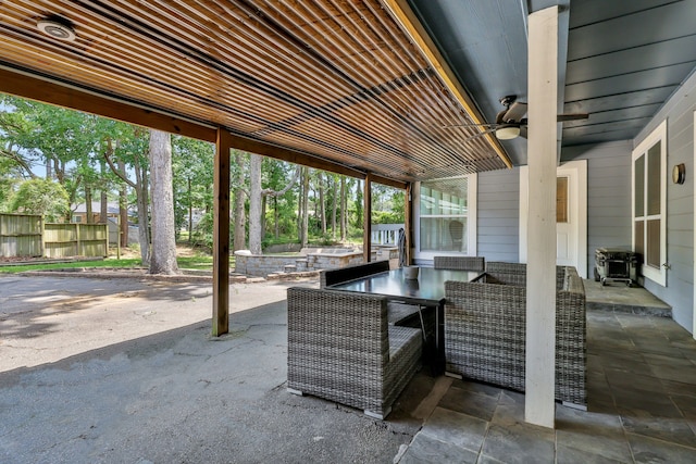 105 N Delmont Dr E, Conroe, TX 77301 - view of patio with outdoor dining space and fence