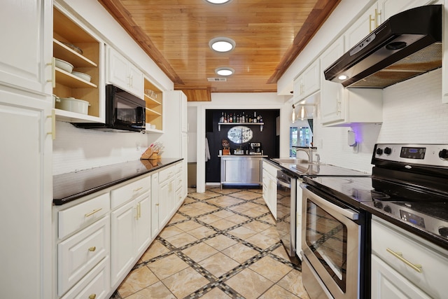 105 N Delmont Dr E, Conroe, TX 77301 - kitchen with stainless steel electric range oven, under cabinet range hood, open shelves, black microwave, and wooden ceiling