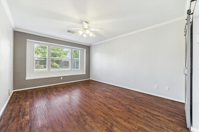 15127 Woodford Hollow Ln, Cypress, TX 77429 - unfurnished room featuring ornamental molding, ceiling fan, baseboards, dark wood-style floors, and a barn door