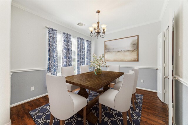 15127 Woodford Hollow Ln, Cypress, TX 77429 - dining room featuring a chandelier, wood finished floors, ornamental molding, and baseboards