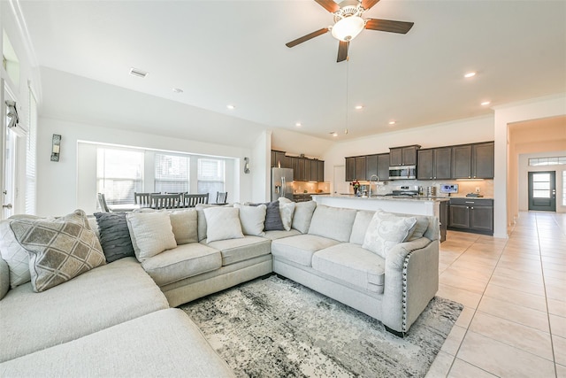 13510 Dovetail Canyon Ct, Rosharon, TX 77583 - living area with light tile patterned floors, ceiling fan, and recessed lighting