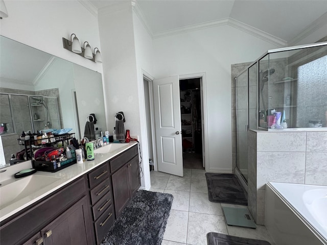 13510 Dovetail Canyon Ct, Rosharon, TX 77583 - bathroom featuring lofted ceiling, a stall shower, double vanity, a bath, and a spacious closet
