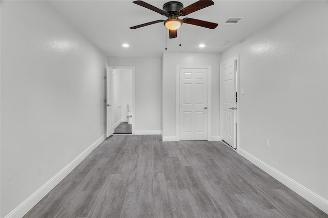 110 Prune St, La Marque, TX 77568 - spare room featuring wood finished floors, ceiling fan, recessed lighting, and baseboards