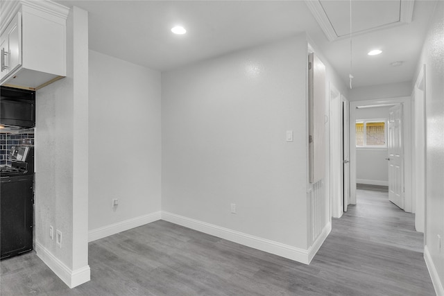 110 Prune St, La Marque, TX 77568 - interior space with attic access, wood finished floors, recessed lighting, and baseboards