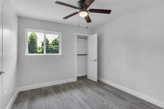 110 Prune St, La Marque, TX 77568 - unfurnished bedroom featuring wood finished floors, baseboards, and a closet