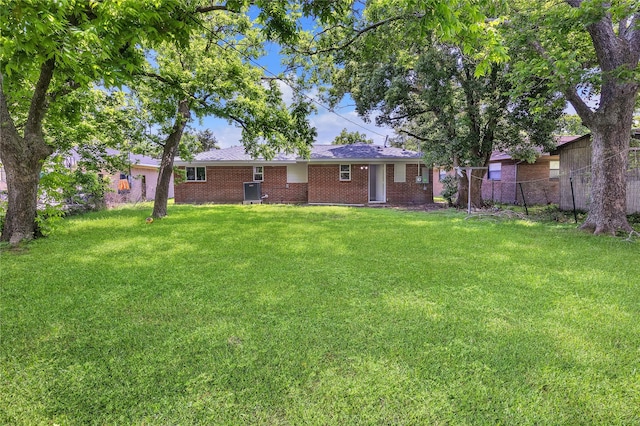 110 Prune St, La Marque, TX 77568 - rear view of house featuring brick siding