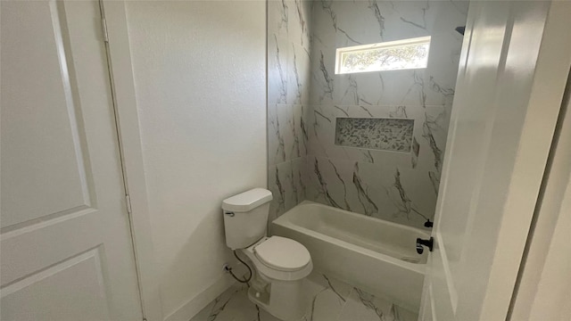 9316 Waller St, Houston, TX 77012 - bathroom featuring toilet, bathing tub / shower combination, and marble finish floors