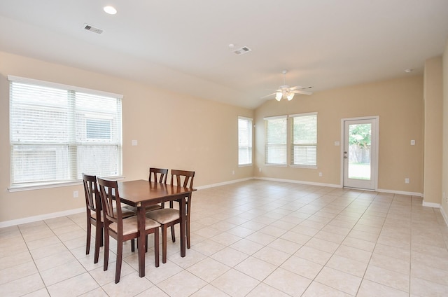 dining space featuring a ceiling fan, light tile patterned floors, baseboards, vaulted ceiling, and recessed lighting