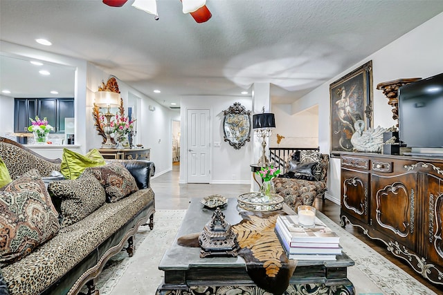13600 Breton Ridge St Unit 25B, Houston, TX 77070 - living room with recessed lighting, a ceiling fan, and baseboards