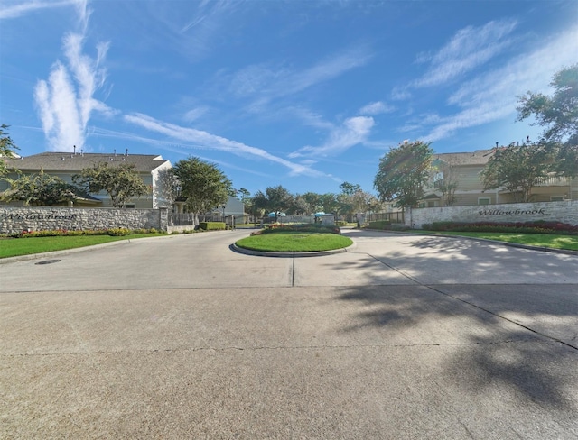 13600 Breton Ridge St Unit 25B, Houston, TX 77070 - view of concrete road with curbs
