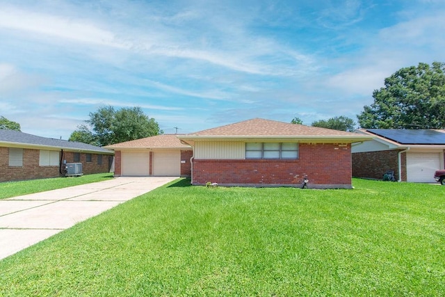 ranch-style house featuring brick siding, concrete driveway, a front lawn, an attached garage, and cooling unit