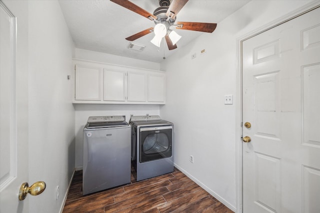 12514 Wealdstone Dr, Tomball, TX 77377 - laundry room featuring cabinet space, washer and clothes dryer, dark wood-type flooring, ceiling fan, and baseboards
