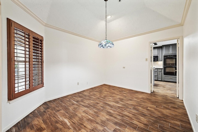12514 Wealdstone Dr, Tomball, TX 77377 - unfurnished dining area with ornamental molding, dark wood finished floors, and baseboards