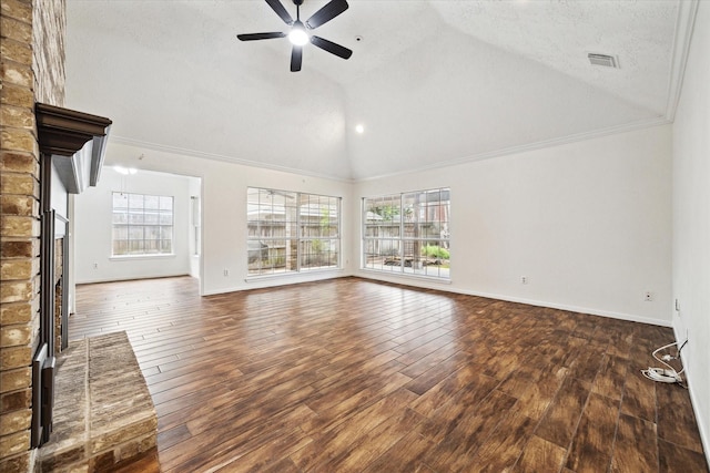 12514 Wealdstone Dr, Tomball, TX 77377 - unfurnished living room with a ceiling fan, healthy amount of natural light, wood-type flooring, crown molding, and high vaulted ceiling