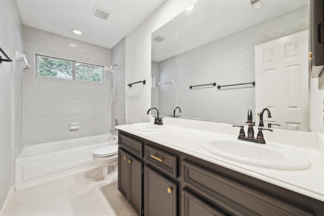 12514 Wealdstone Dr, Tomball, TX 77377 - full bathroom featuring toilet, double vanity, shower / bathtub combination, and tile patterned floors
