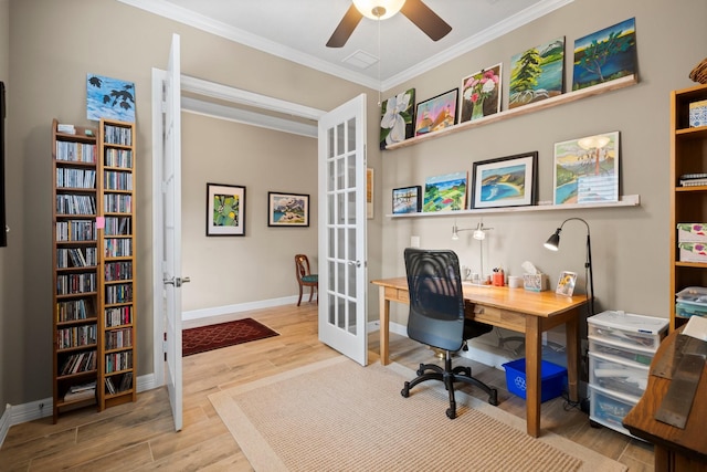 office space featuring french doors, crown molding, a ceiling fan, baseboards, and wood finished floors
