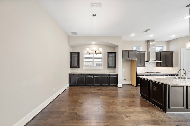 1404 Arkley Way, Houston, TX 77055 - kitchen with wall chimney range hood, a chandelier, a sink, plenty of natural light, and recessed lighting