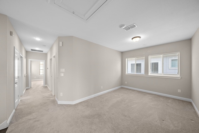 1404 Arkley Way, Houston, TX 77055 - empty room with light colored carpet, baseboards, and attic access