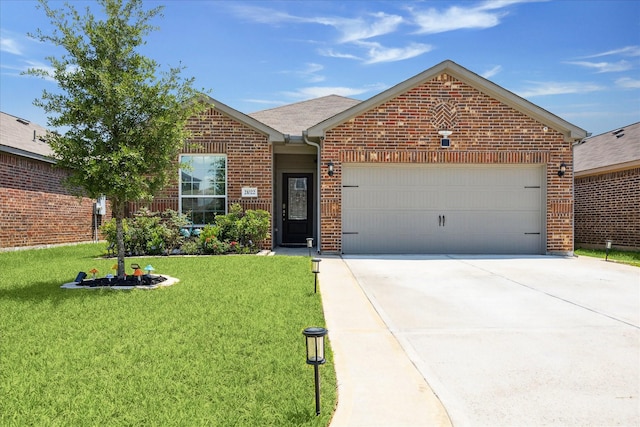21022 Solstice Point Dr, Hockley, TX 77447 - ranch-style home with brick siding, an attached garage, a front lawn, and concrete driveway