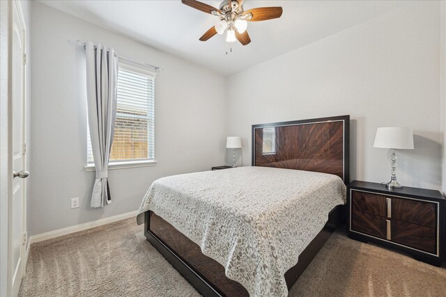 21022 Solstice Point Dr, Hockley, TX 77447 - bedroom featuring carpet flooring, baseboards, and a ceiling fan